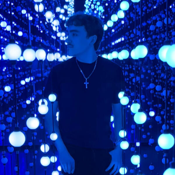 A portrait of Max Nikiforov, the national academy of sports medicine certified personal trainer.